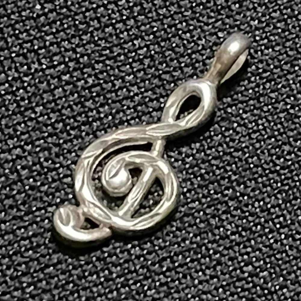 Treble clef pendent